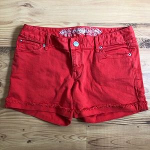 Express coral red denim shorts